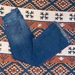 Women’s 7 for all mankind jeans size 28 DOJO stretchy raw hem.